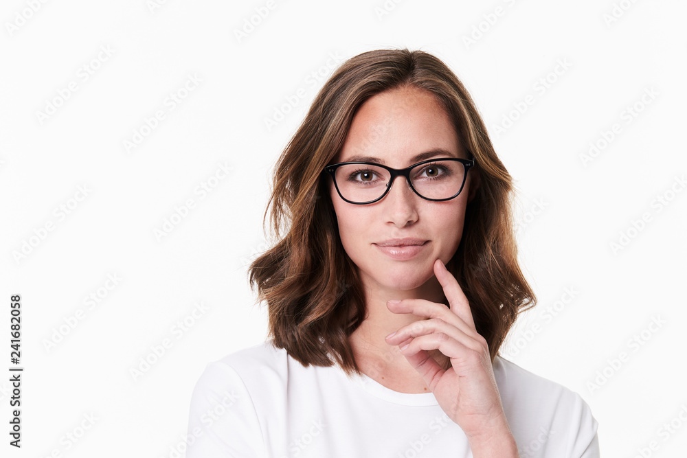 Thoughtful glasses girl on white background Thoughtful glasses girl on white background