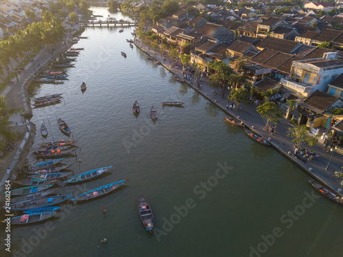 Aerial view of Hoi An old town or Hoian ancient town in night. Royalty high-quality free stock photo image top view of Hoai river and boat traffic Hoi An. Hoi An street and river in night with light photo