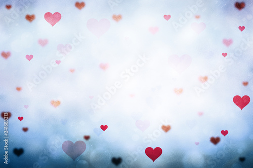 Beautiful pink and red colored blurry Valentine's Day Hearts on frozen window illustration background.