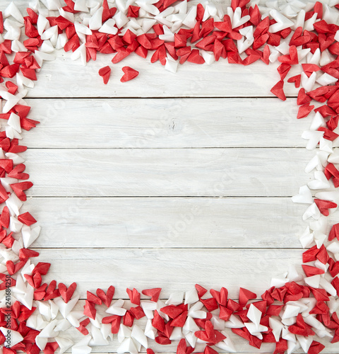 Fototapeta Naklejka Na Ścianę i Meble -  White and red  paper heart on wooden