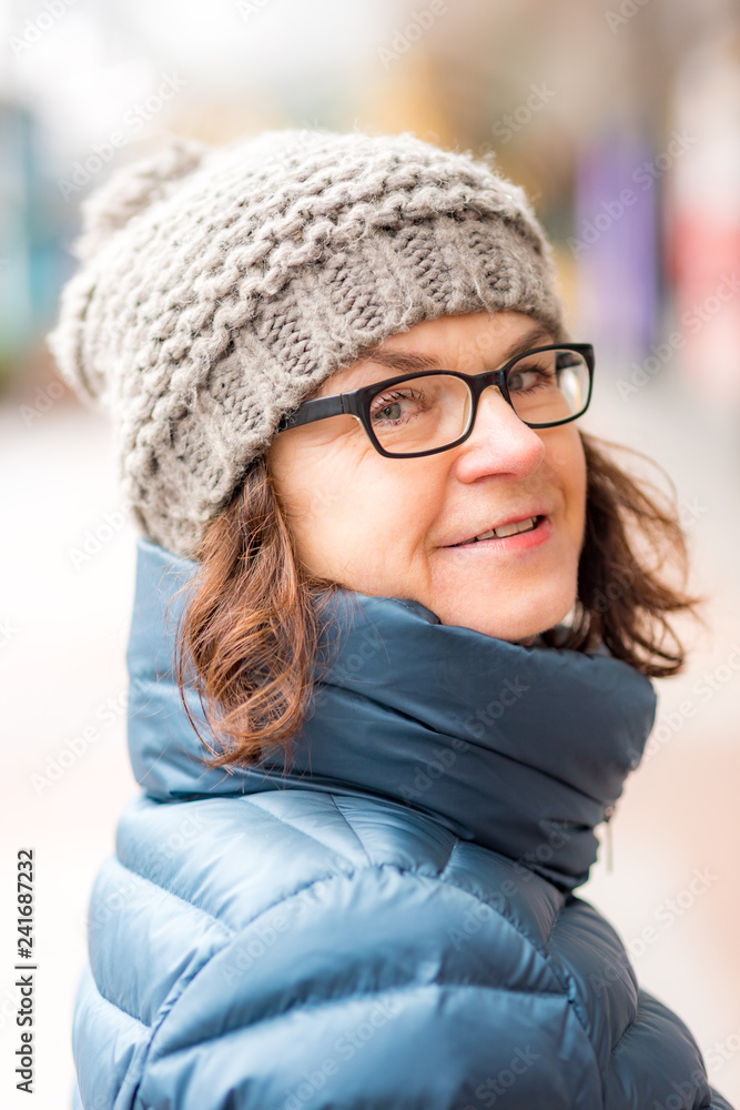 Woman with cap and glasses Woman with cap and glasses