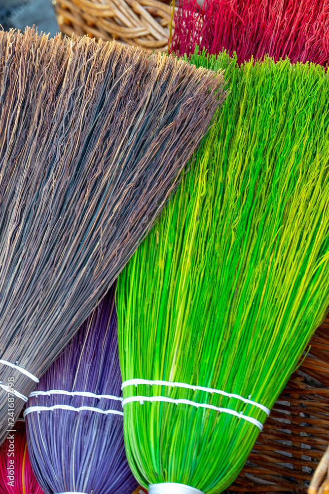 Bunte Besen StockFoto Adobe Stock