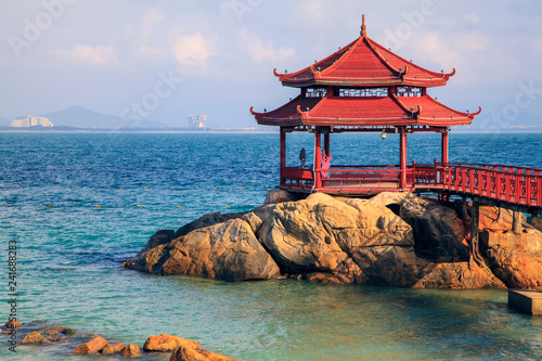 Wuzhizhou Island. Arbor at beach of island photo