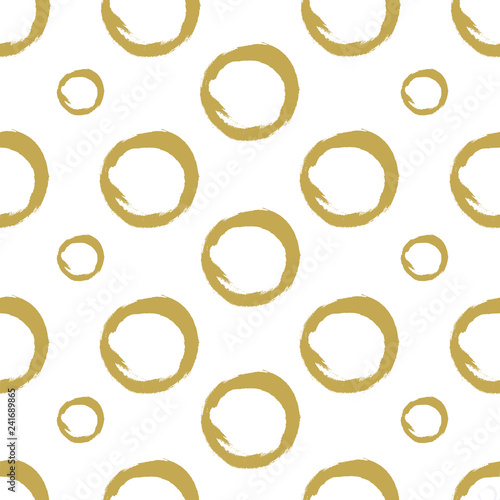 Hand drawn golden circles on a white background. Paint texture. Seamless vector pattern . Vector