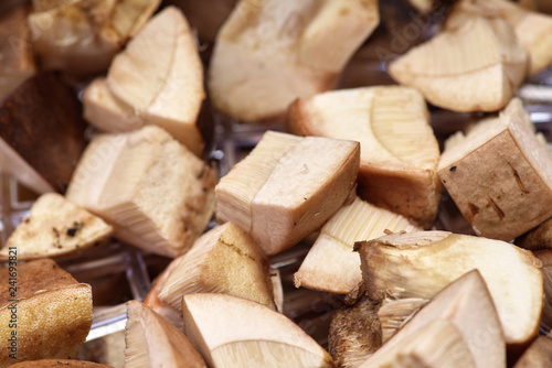 Sliced fresh mushrooms boletus in bowls close-up