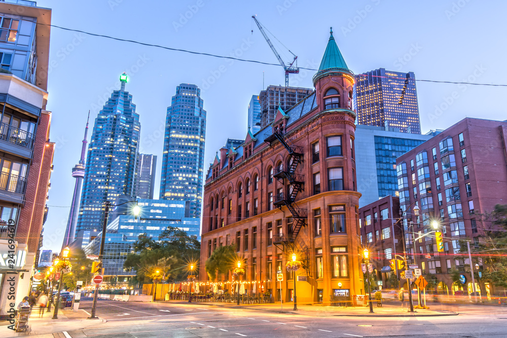 Fototapeta premium Gooderham Building in Toronto with CN Tower in the Background