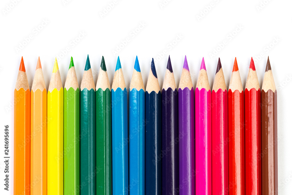 Colour pencils on white background, top view. Colour pencils on white background, top view.