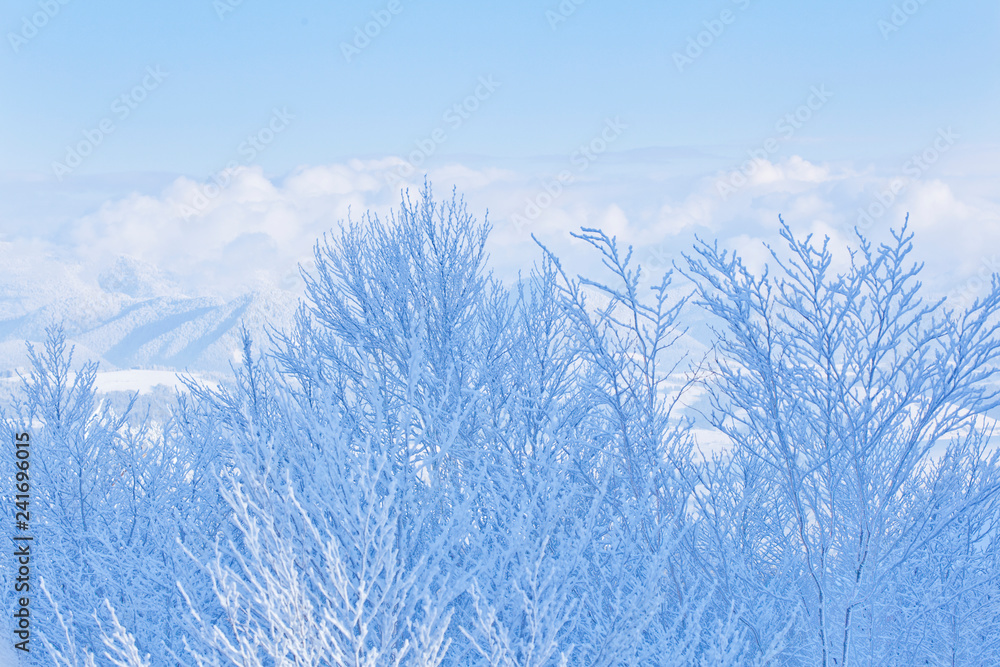 blue winter abstract background with trees pattern and mountains blue winter abstract background with trees pattern and mountains