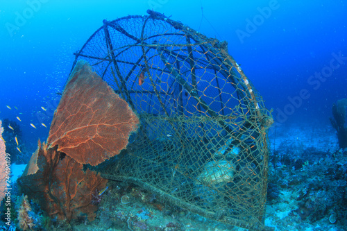 Canvas Print Fish trap (net or cage) damaging coral reef in Thailand