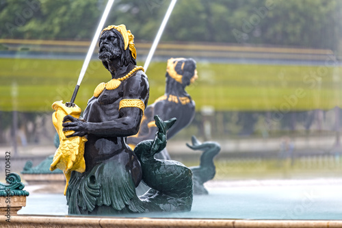 Close up of the Fontaine des Mers on Place de la Concorde in Paris photo