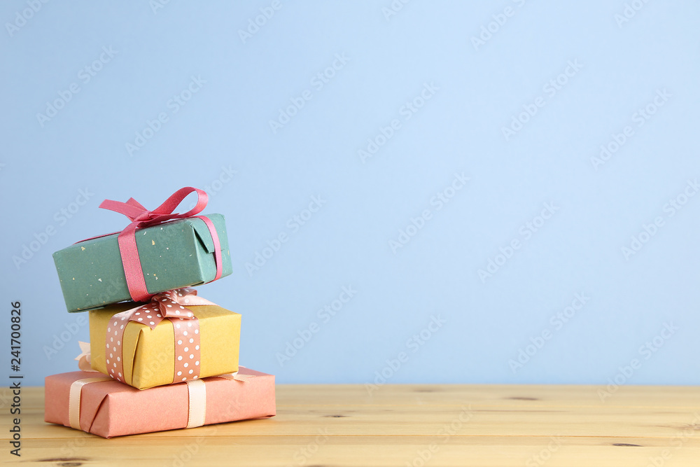 Many gift box on wooden table. Christmas or birthday concept