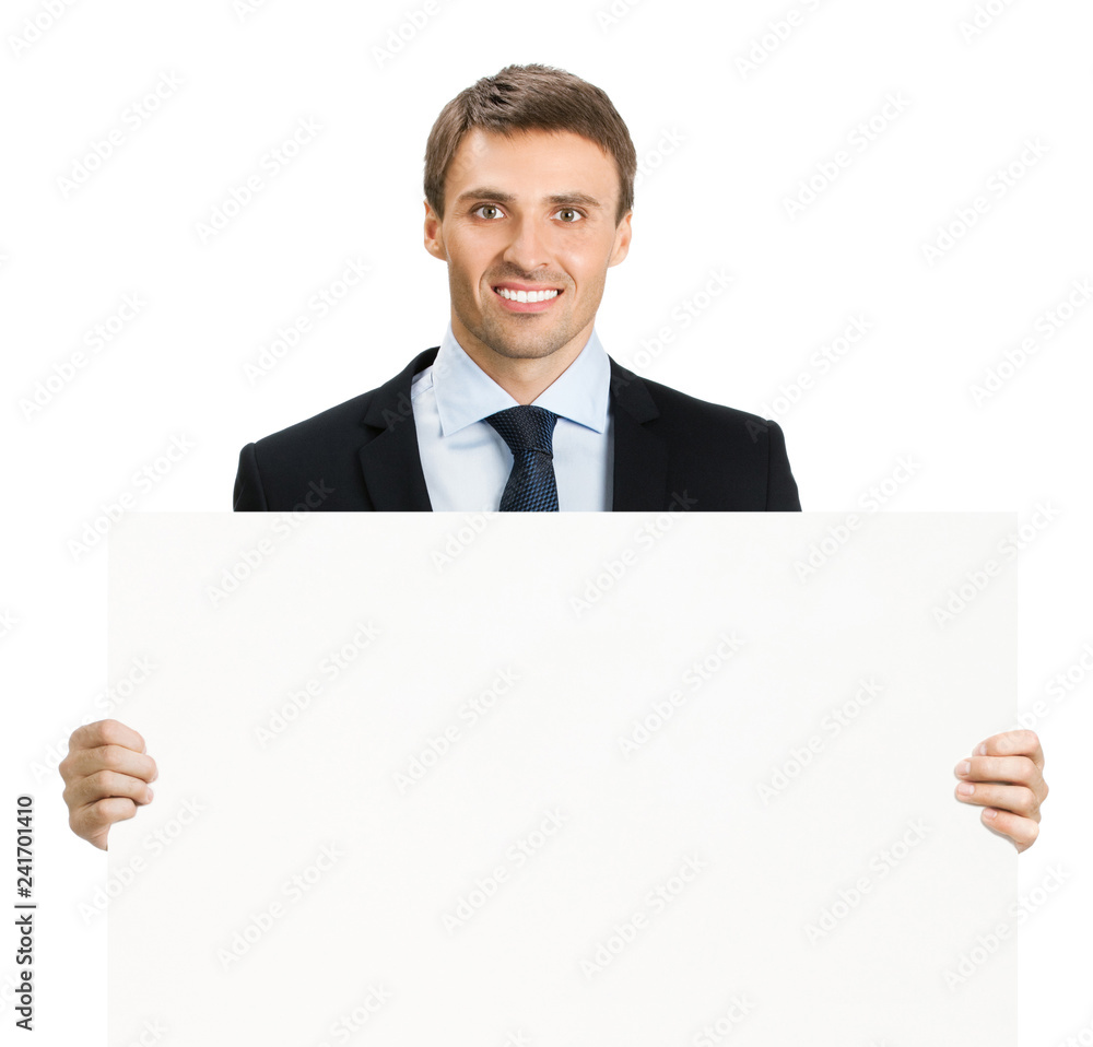 Happy businessman showing signboard, isolated Happy businessman showing signboard, isolated