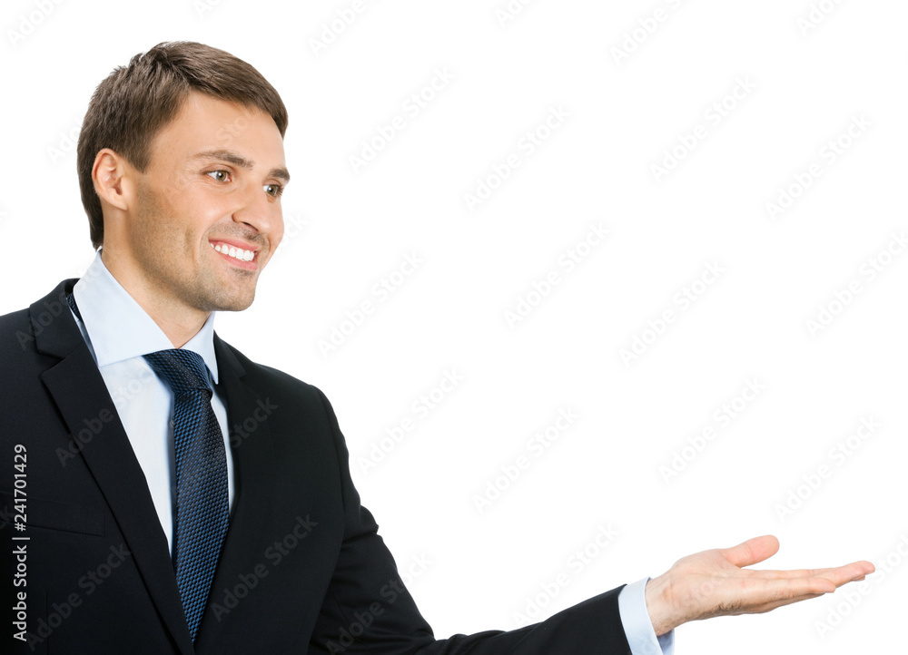 Businessman showing blank area for sign or copyspase Businessman showing blank area for sign or copyspase