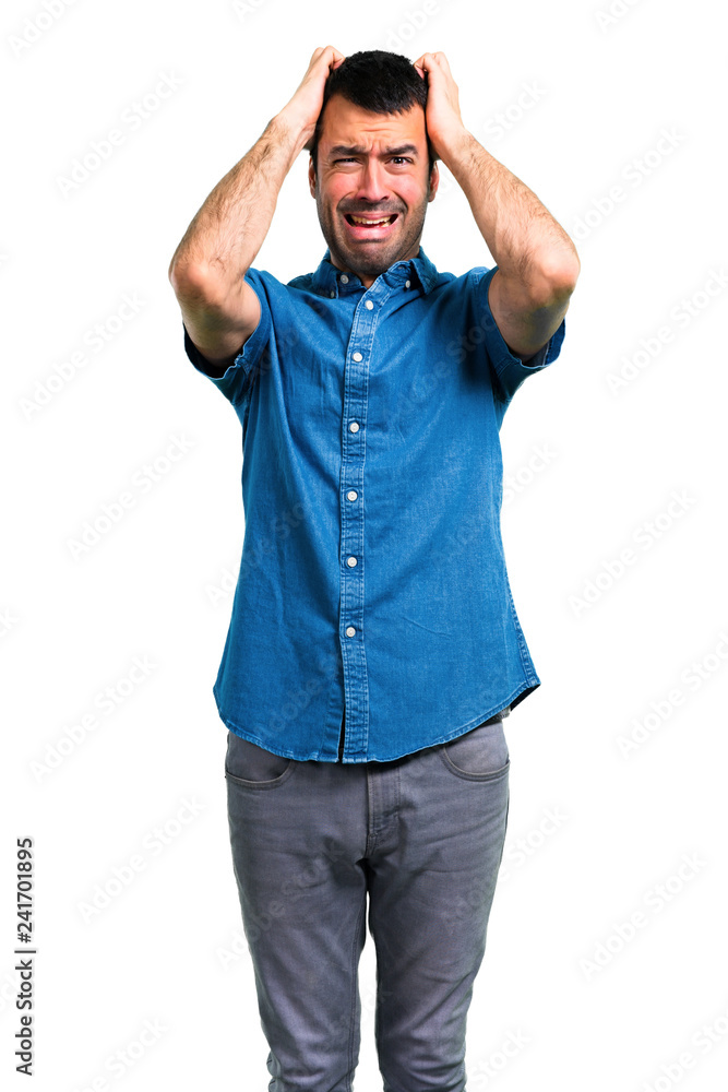 Handsome man with blue shirt unhappy and frustrated with something. Negative facial expression Handsome man with blue shirt unhappy and frustrated with something. Negative facial expression