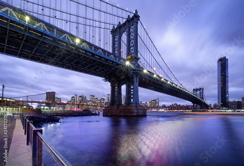 Manhattan Bridge at night. ...