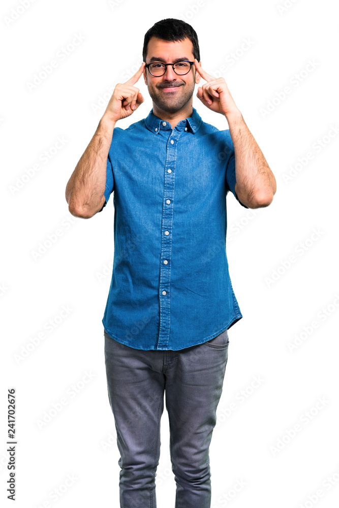 Handsome man with blue shirt and glasses Handsome man with blue shirt and glasses