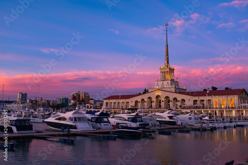 Seaport with mooring boats at sunset in Sochi, Russia