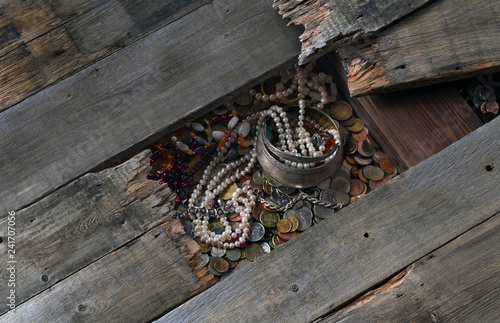 treasure of coins and jewels under the floor boards
