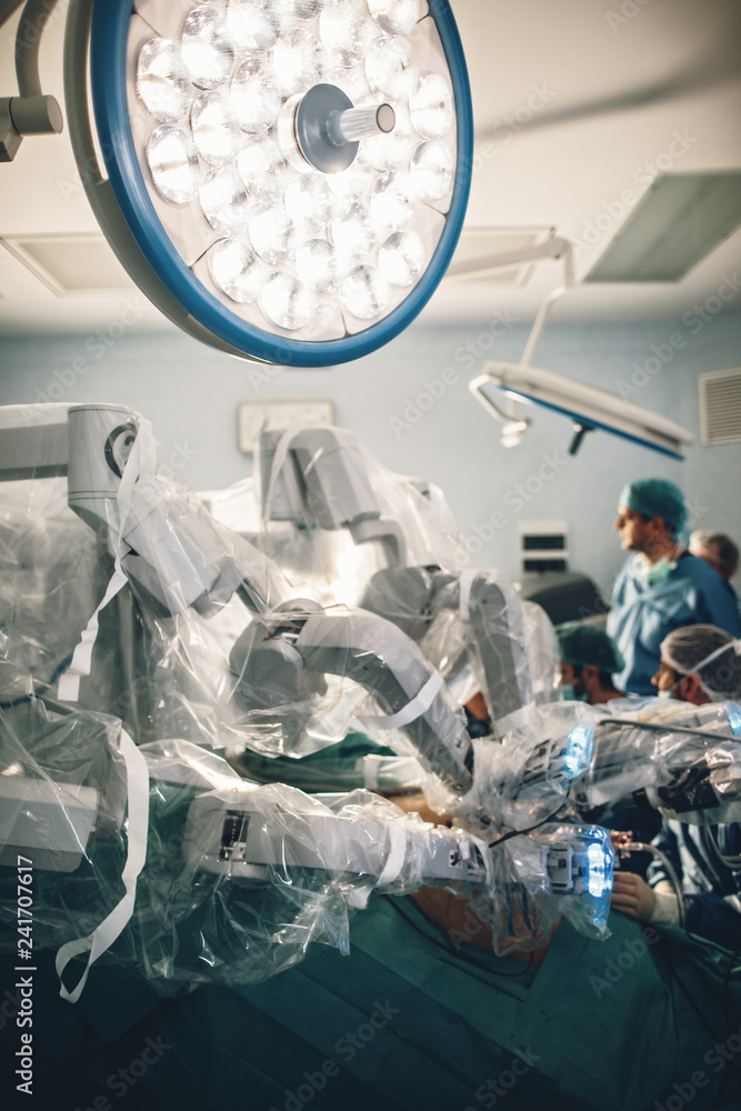 Surgical room in hospital with robotic technology equipment, machine
