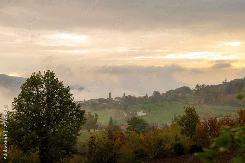 Photographs of views from Mount Penice of a cloudy landscape