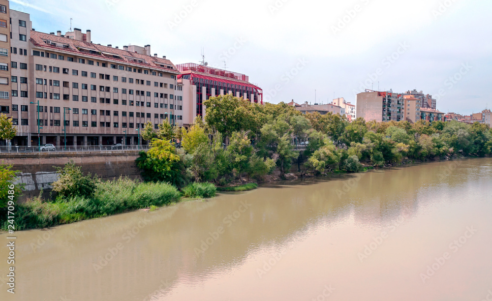 Ebro River in Zaragoza with buildings on one side