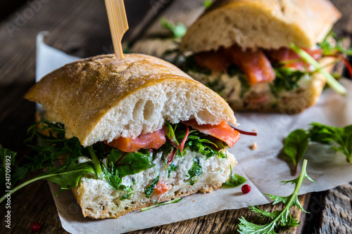Tableau sur toile Big sandwich with salmon and cream cheese