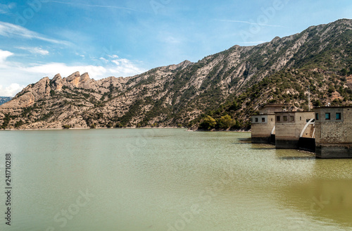 Lake in Catalonia with the Pyrenees mountains in the background.