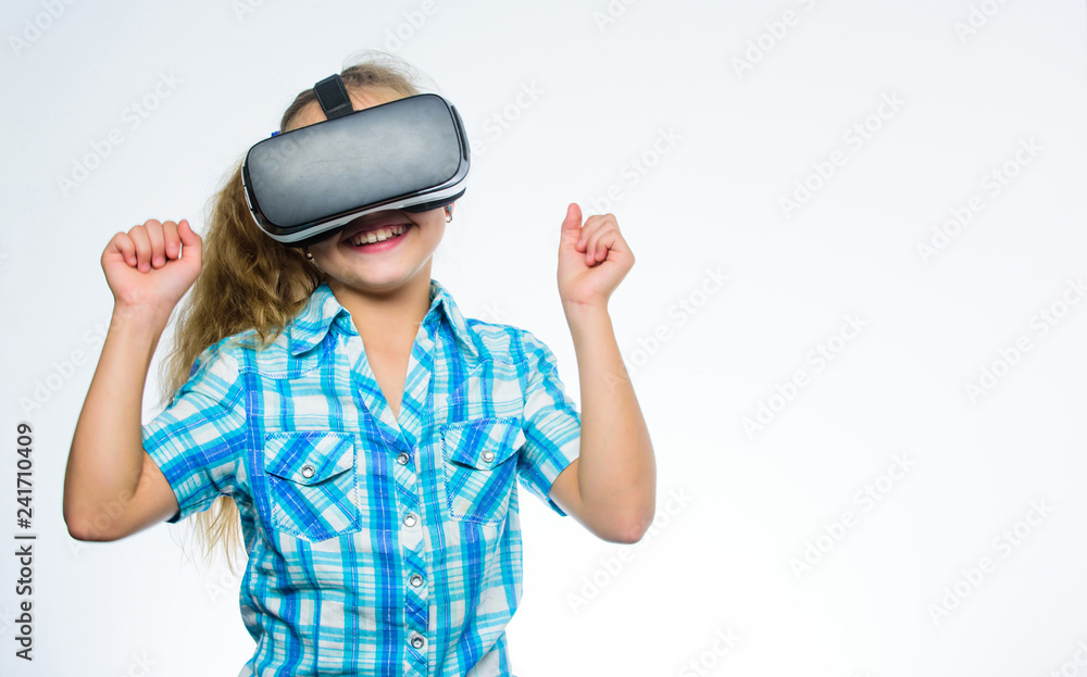 Kid explore modern technology virtual reality. Virtual education for school pupil. Girl cute child with head mounted display on white background. Get virtual experience. Virtual reality concept Kid explore modern technology virtual reality. Virtual education for school pupil. Girl cute child with head mounted display on white background. Get virtual experience. Virtual reality concept