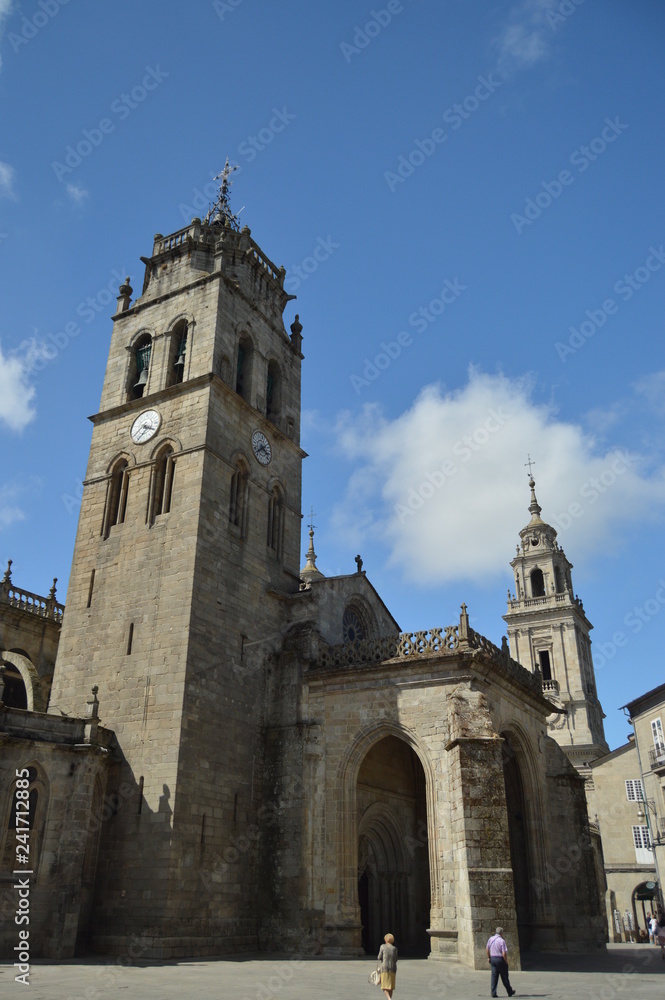 Tower of the Cathedral of Santa María temple that holds the privilege of the permanent exhibition of the Blessed Sacrament In Lugo. Travel, Architecture, Holidays. August 3, 2015. Lugo Galicia Spain.