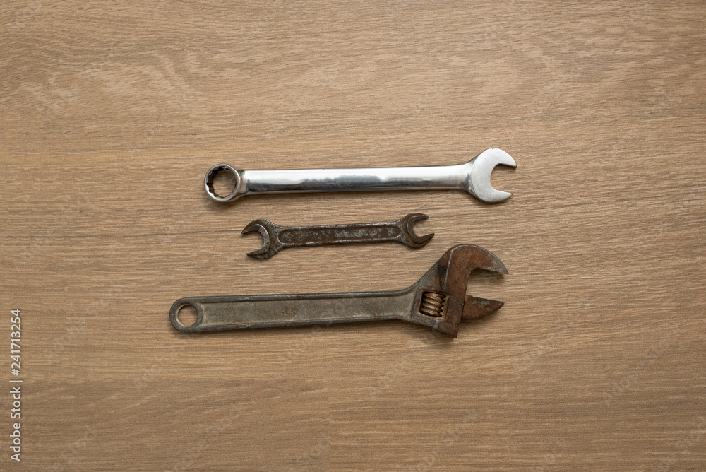 sloppy wrench slapper kit on wood backgroung sloppy wrench slapper kit on wood backgroung