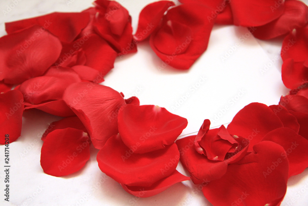 Heart of a rose-petal red light background macaroons Heart of a rose-petal red light background macaroons