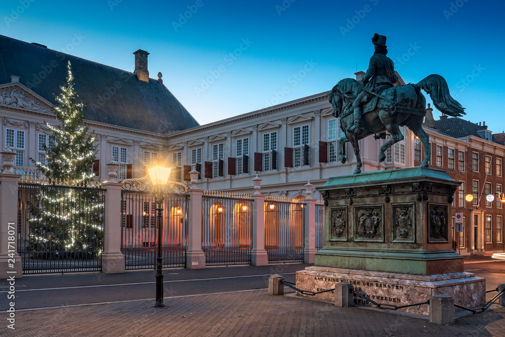public square in front of Noordeinde Palace at dusk