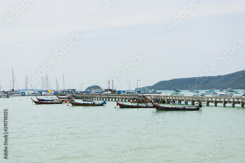 Many luxury yachts moored at Chalong Pier on sunny day in Phuket,Thailand photo