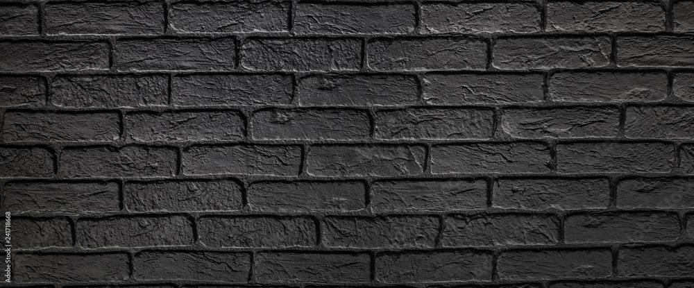 Black abstract brick wall texture, brick surface for background. Vintage wallpaper.