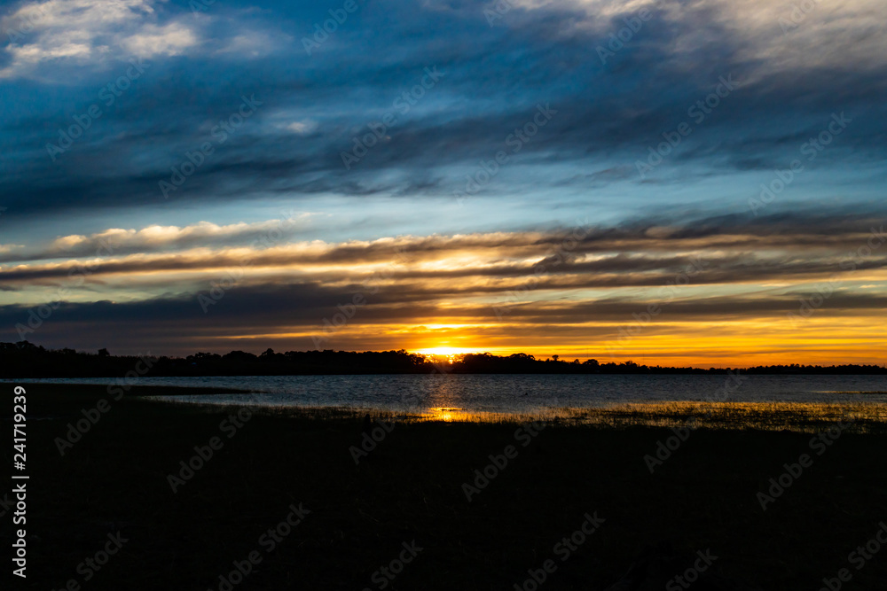 Sunset river horizon view