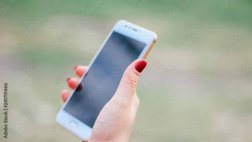 woman with smartphone close up