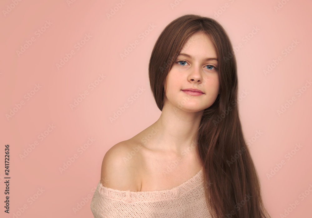 Fototapeta premium blue eyed brown haired shy girl with flowing hair