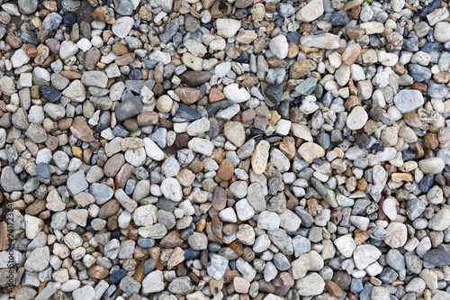 Close-up texture of colorful sea pebbles. Small Rock. Sea background