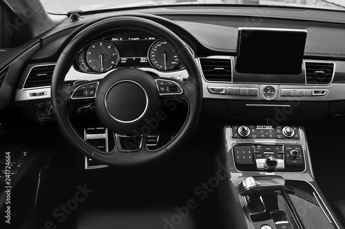 View of the interior of a modern automobile showing the dashboard © Stasiuk