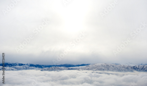 aerial view of clouds over city from airplane