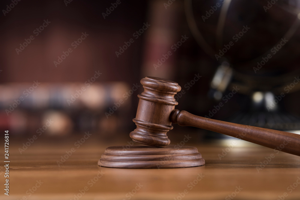 Globe, Law theme, mallet of judge, wooden gavel Globe, Law theme, mallet of judge, wooden gavel