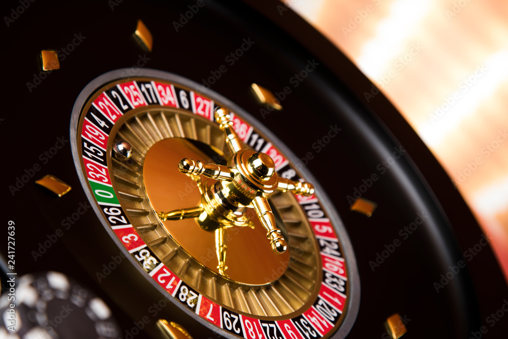 Roulette wheel running in a casino Roulette wheel running in a casino