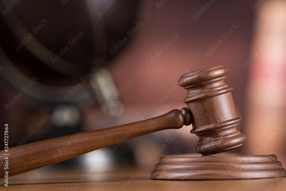 Globe, Law theme, mallet of judge, wooden gavel Globe, Law theme, mallet of judge, wooden gavel