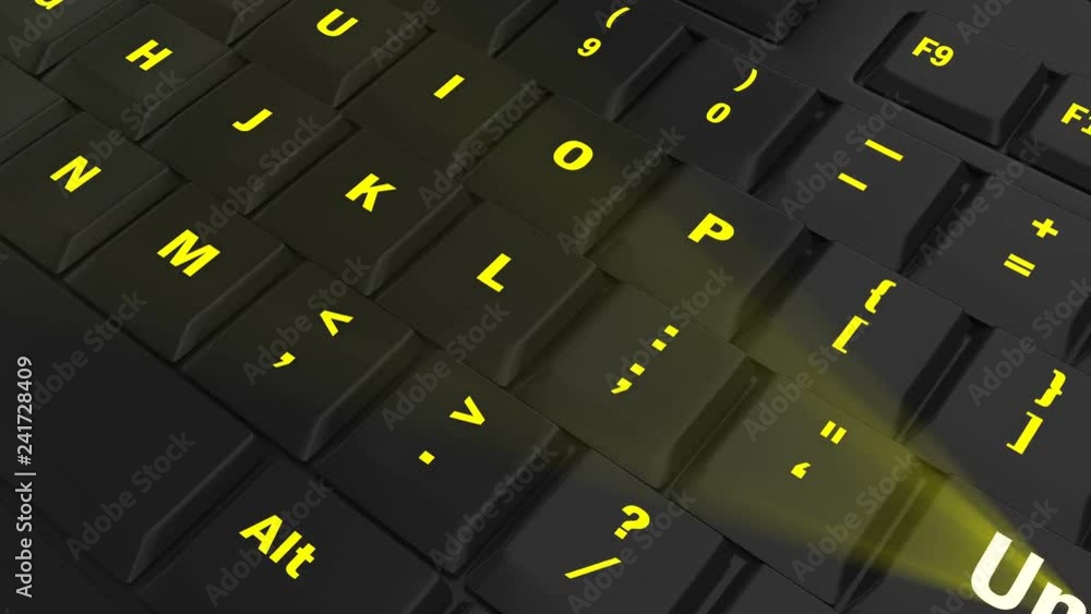 pointing the camera on yellow glowing Unlock key on black computer keyboard pointing the camera on yellow glowing Unlock key on black computer keyboard