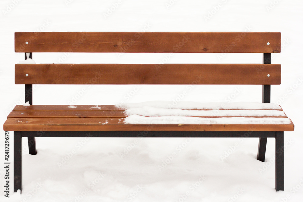 wooden bench in the Park under the snow wooden bench in the Park under the snow