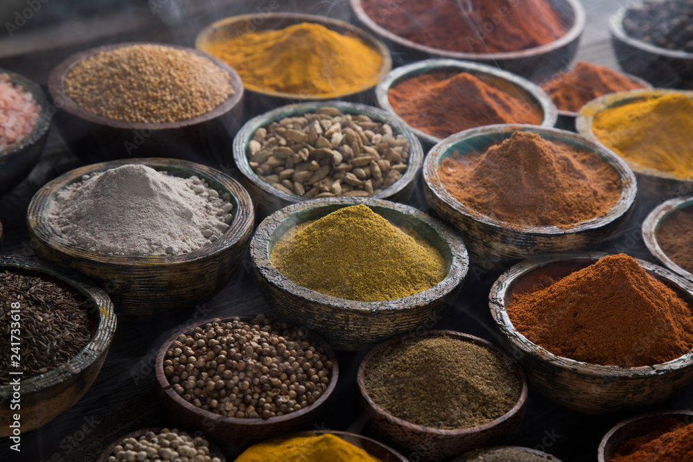 Aromatic spices on wooden background Aromatic spices on wooden background