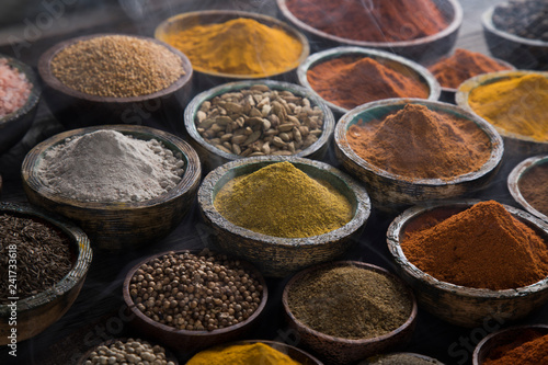 Aromatic spices on wooden background © Sebastian Duda
