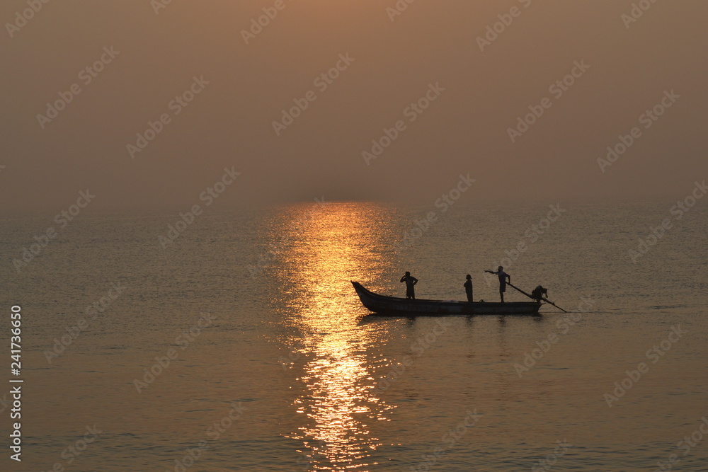 Boat at sunrise