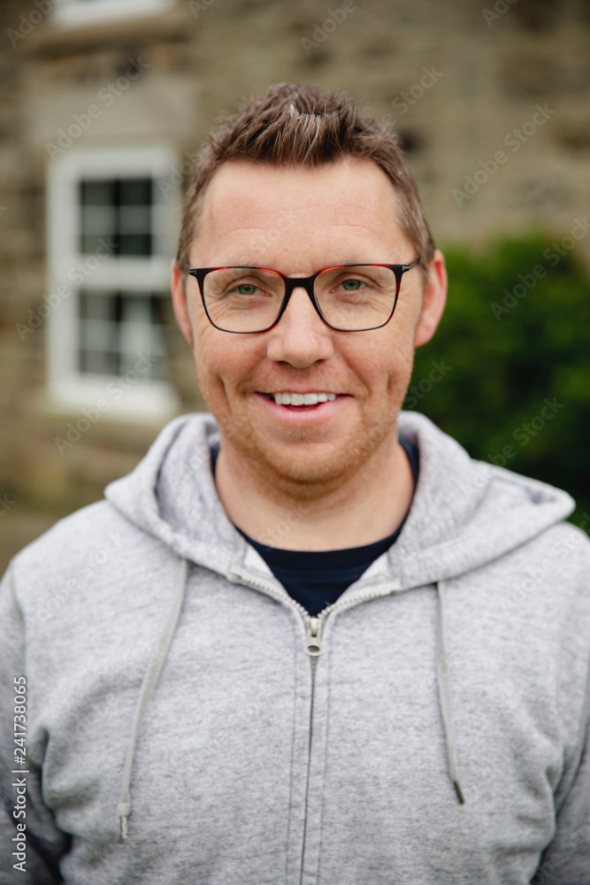 Portrait of a Smiling Mid Adult Man Portrait of a Smiling Mid Adult Man
