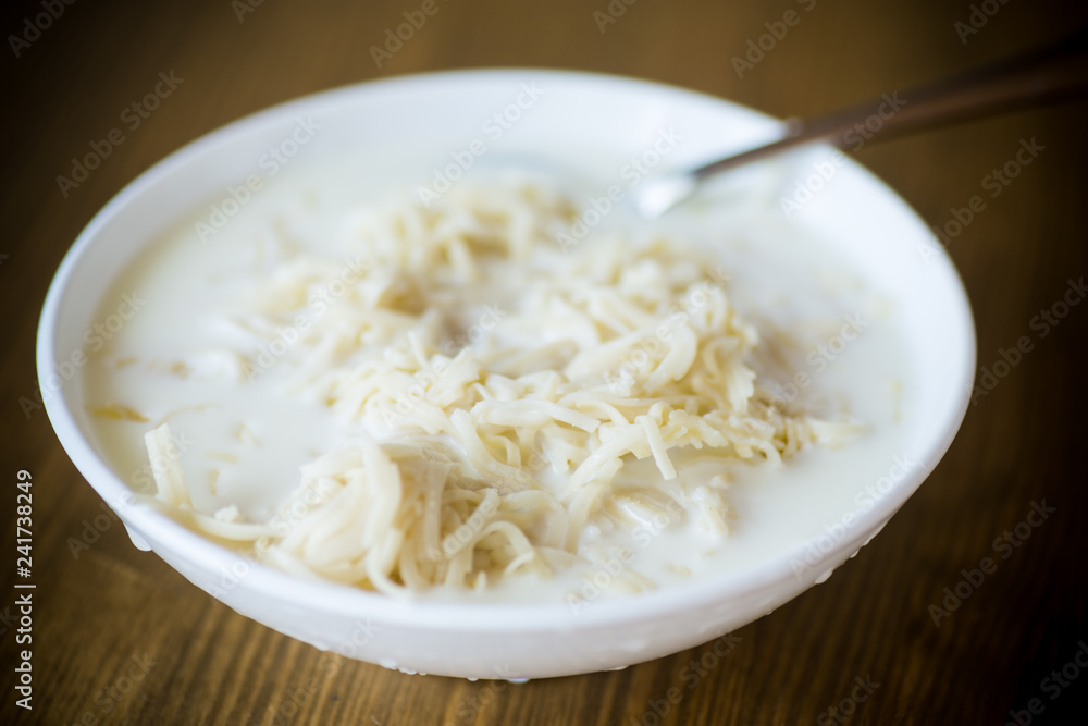homemade sweet noodles with milk in a plate homemade sweet noodles with milk in a plate